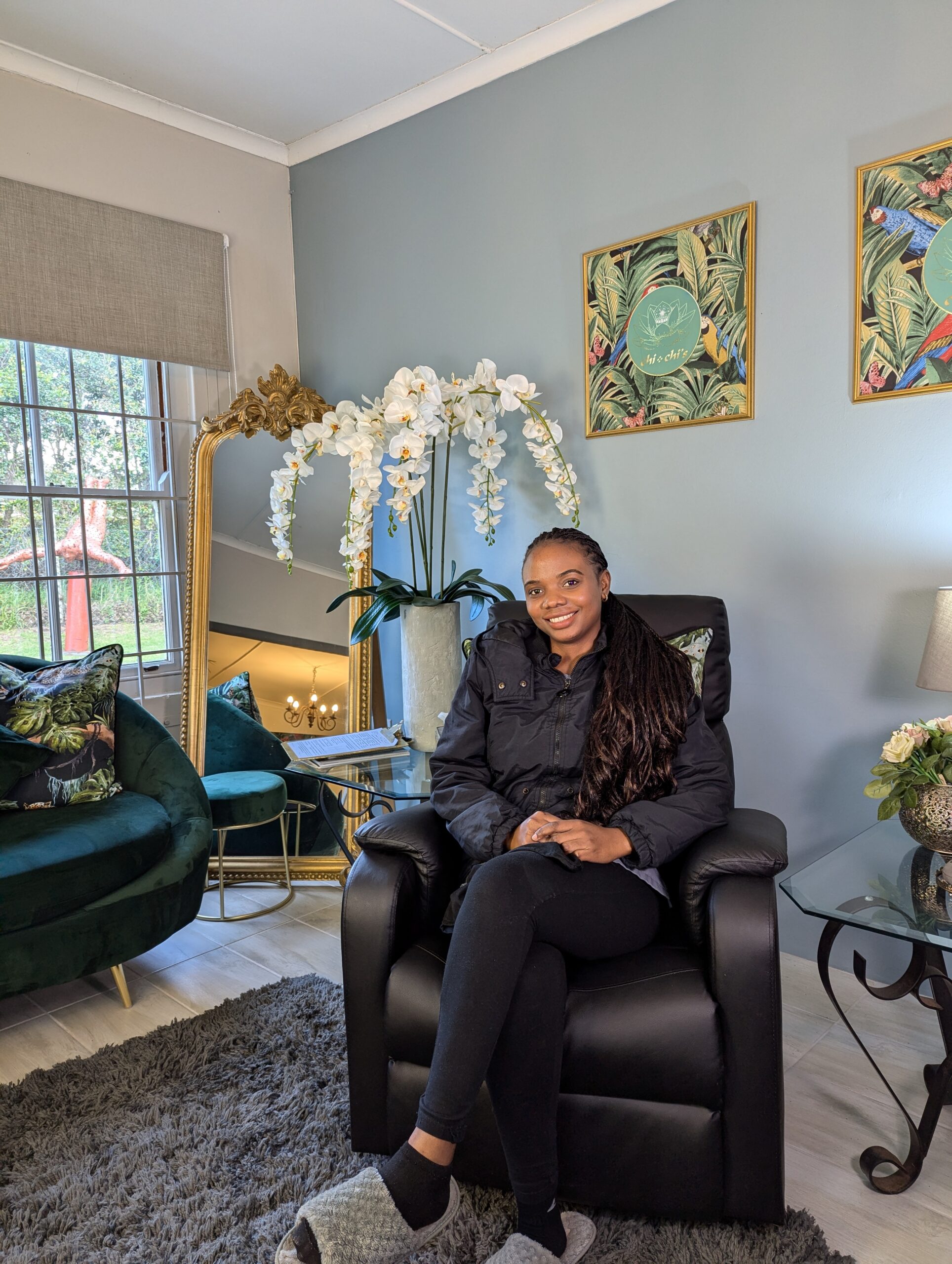 chi chis retreat and spa african therapist smiling